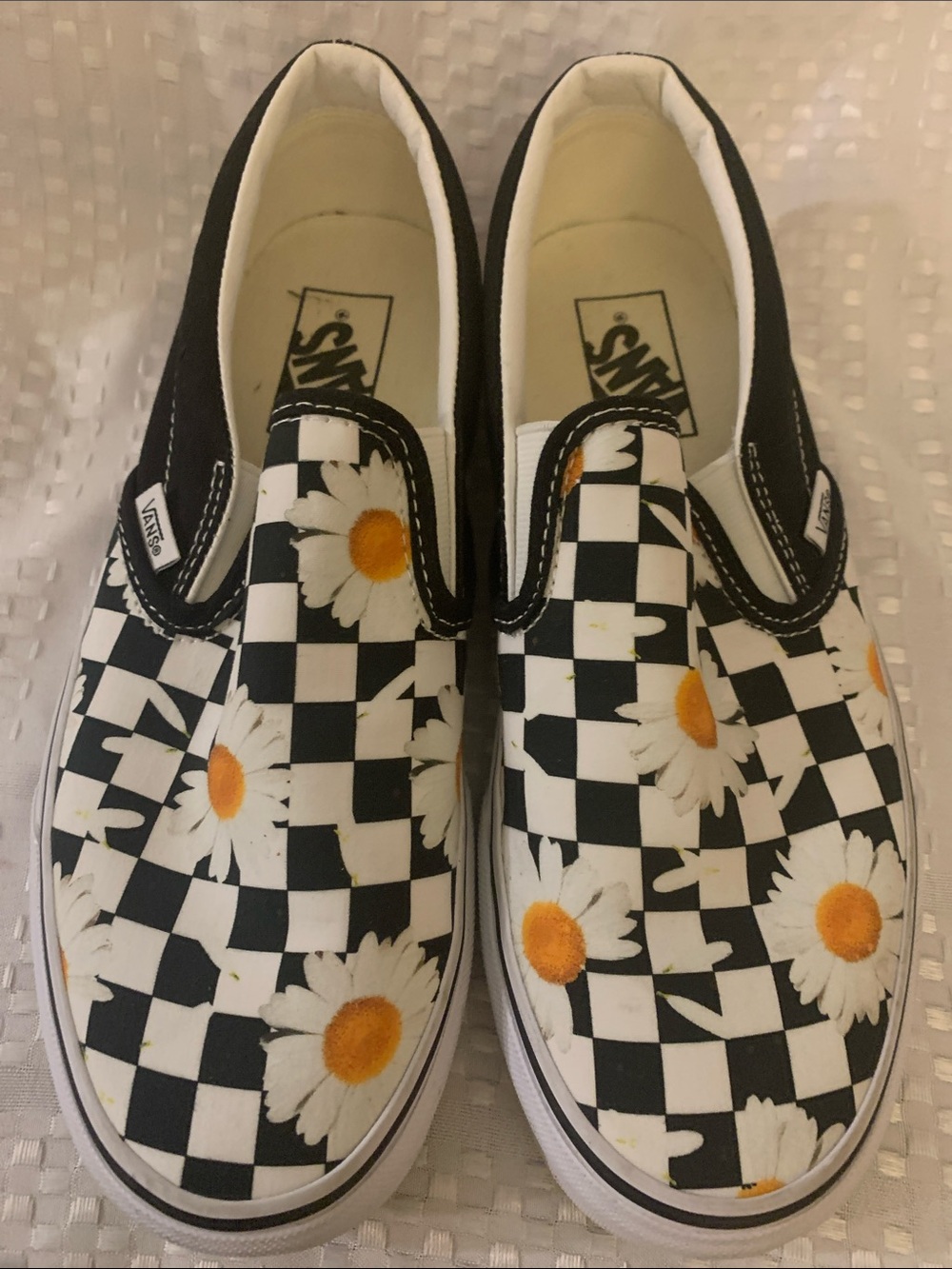 Vans Women’s Black/White Checkerboard Sneakers with Daisy Accents, size 8.